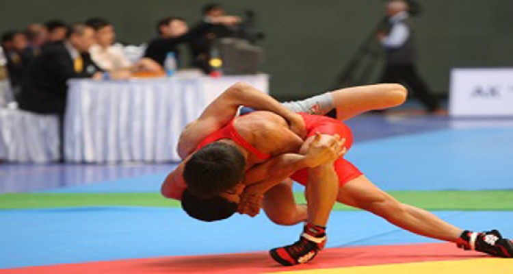 مسابقات چند جانبه کشتی یادوره شهدای کشتی گیر در هرسین برگزار می شود