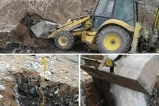 دفن بهداشتی لاشه های تلف شده دام در یکی از دامداری های شهرستان