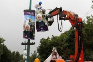 اعتراض متفاوت کارمندان کرمانشاهی به تبلیغات روحانی از بیت المال اعتراض متفاوت کارمندان کرمانشاهی به تبلیغات روحانی از بیت المال